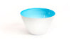 A sky blue handblown glass bowl. Made in the USA from Serve Kindness.  