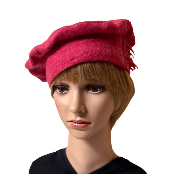 Rose colored wool hat with fringe